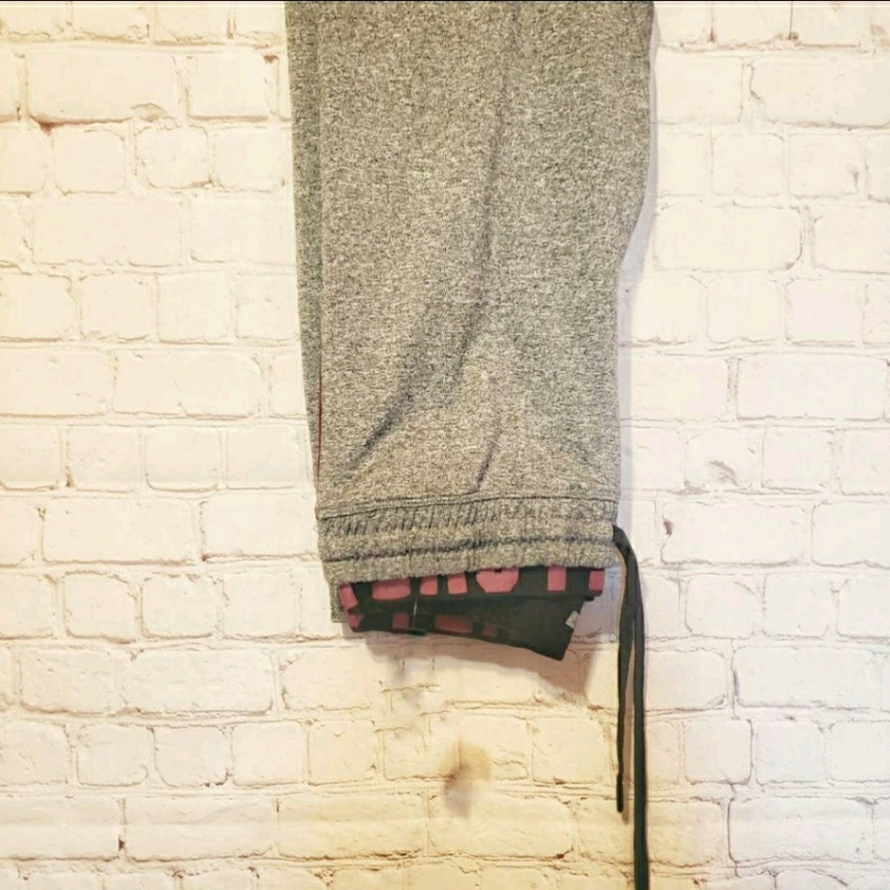 Maroon, black and gray pants that were never worn.